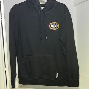 Small size sweater in black color.